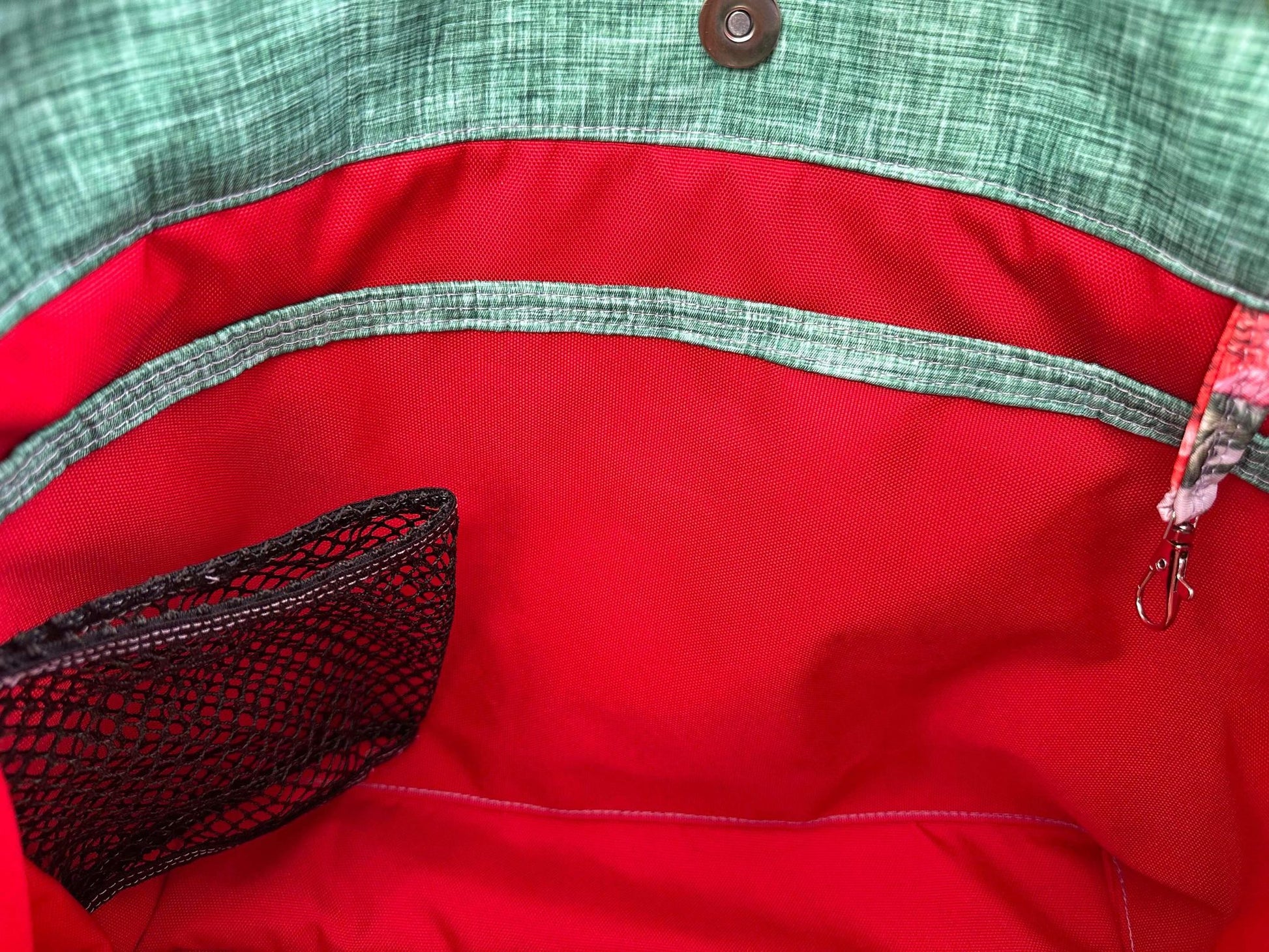 Interior slip pocket, waterbottle holder and key tab